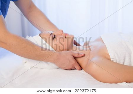 girl masseur doing massage in spa health 