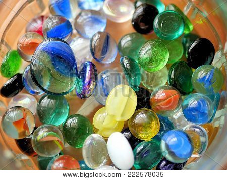 Bright Colorful Marble Balls Toys in Sunlight