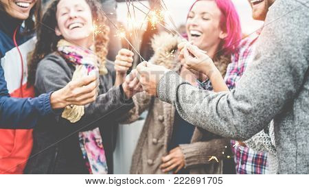 Group Of Friends Celebrating With Sparklers Outdoor - Trendy People Having Fun Togehter With Firewor