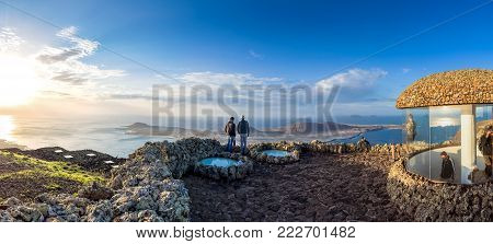 Lanzarote, Spain - December 26, 2016: Unidentified Tourists Look At Atlantic Ocean And La Graciosa I