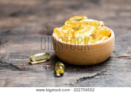 Fish Oil Capsules With Omega 3 And Vitamin D. Healthy Diet Concept.