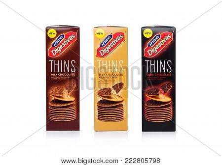 LONDON, UK - JANUARY 20, 2018: Boxes of McVities Digestives thins with  chocolate on white background