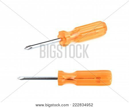 Tiny crosshead screwdriver with a plastic orange handle, isolated over the white background, set of two different foreshortenings