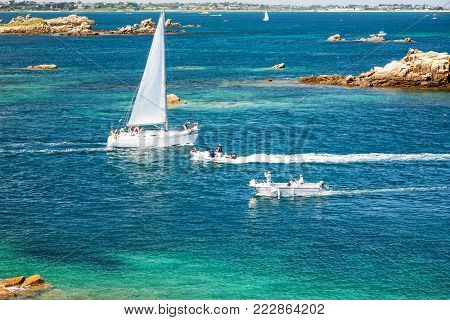 travel to France - above view of yacht and boats near coast of Ile-de-Brehat island in Cotes-d'Armor department of Brittany in summer sunny day