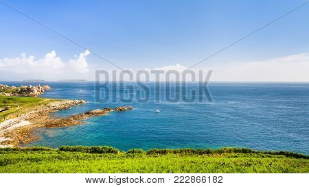 travel to France - view of coastline of English Channel from Saint-Guirec area of Perros-Guirec commune on Pink Granite Coast of Cotes-d'Armor department in the north of Brittany in summer morning