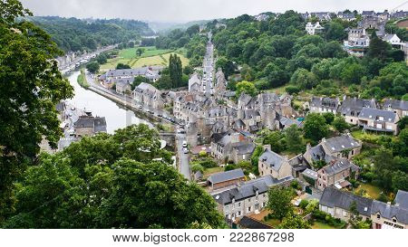 travel to France - view of Dinan town and Rance river from belvedere at Promenade de la Duchesse Anne of the Jardin Anglais (English garden) in rain