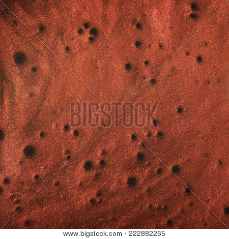 Smart hand putty plasticine playdough spread over the surface and framed as a close-up backdrop texture composition