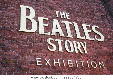 LIVERPOOL, ENGLAND - APRIL 20, 2012 : Sign of The Beatles Story at Albert Dock, Liverpool United Kingdom. The famous museum and exhibition about the music band The Beatles.