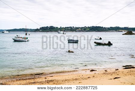 ILE-DE-BREHAT, FRANCE - JULY 4, 2010: boats near Guerzido beach in Brehat commune. Ile-de-Brehat is island and commune located near Paimpol town, a mile from the northern coast of Brittany