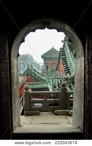 The roofs of the monasteries of Wudang. View from the arch. China
