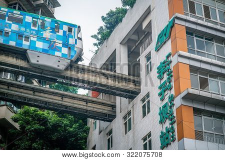 Chongqing China, 7 August 2019 : Close-up View Of Chongqing Metro Train About To Enter Liziba Statio