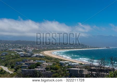 Spectacular Seascape Panorama Of Picturesque Beach And Seaside Town. Plettenberg Bay, South Africa