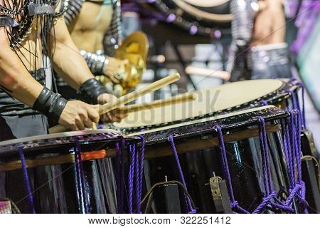A Drummer Is Performing On The Stage. A Musician Is Drumming On The Drum Performance. Closeup View O