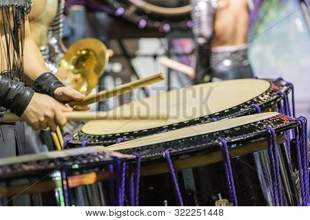 Closeup View Of Man's Hands, Drums And Drumsticks.