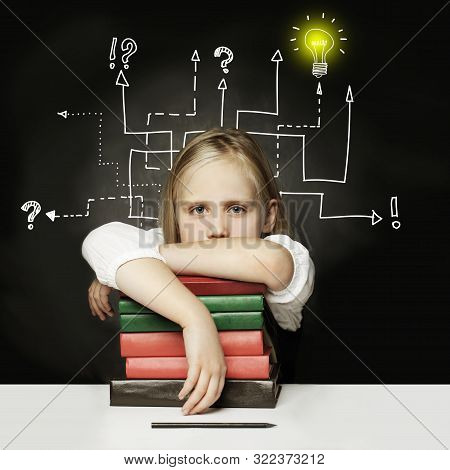 Tired Child With Books Thinking On Chalkboard. Nascency Idea In Head Young Student. Many Paths For S