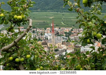 The City Of Schlanders (south Tyrol, Italy) From Above On A Cloudy Day In Summer