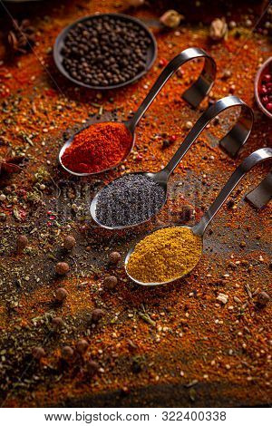 Aromatic Spices In Metal Aspoons. Spice Concept