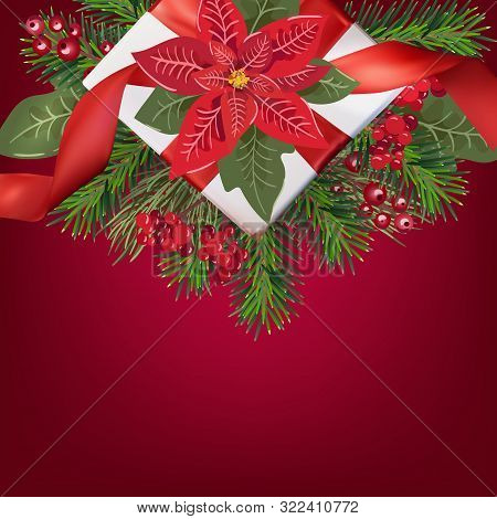 Merry Christmas Greeting Card With Gift Box And Xmas Tree On Red Gradient Background With Copyspace.