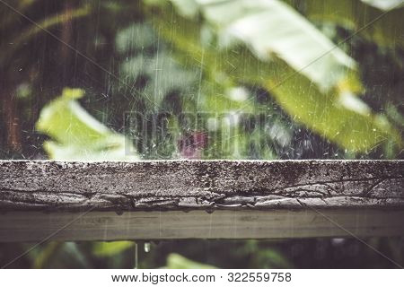 Rain Drops On Slab With Green Background