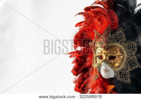 Italian Carnival. Venetian Red Black And Gold Mask. Mysterious Event, Party.