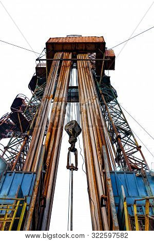 Oil And Gas Drilling Rig. Oil Platform Isolated On White Background. Drilling Rig In Oil Field For D
