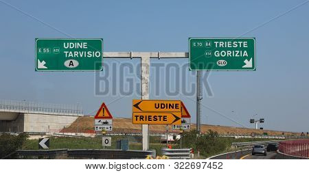 Motorway Junction With Road Signs With The Arrows With The Detour For The Italian Cities Of Palmanov