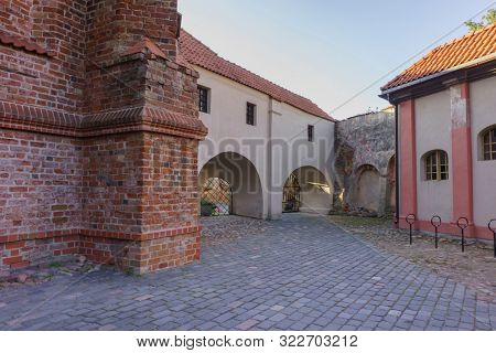 VILNIUS, LITHUANIA - JULY 30, 2019:  Facade of Roman Catholic Church of St. Anna in Vilnius (lit. Church of the Holy Onos) and  Church Of St. Francis And St. Bernard, Details, UNESCO World Heritage