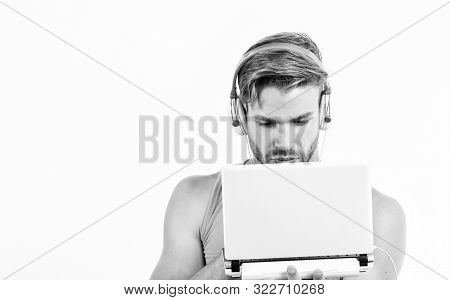 Searching For Favorite Music. Sexy Muscular Man Listen Audio. Man In Earphones Isolated On White. E 