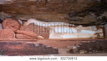 Sleeping Buddhism Statue At The Pidurangala Mountain. Sigiriya Sri Lanka.