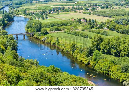 view over patchwork fields and river of the Dordogne valley from Domme, Aquitane, France
