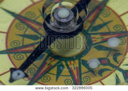 An Old Compass To Follow The North