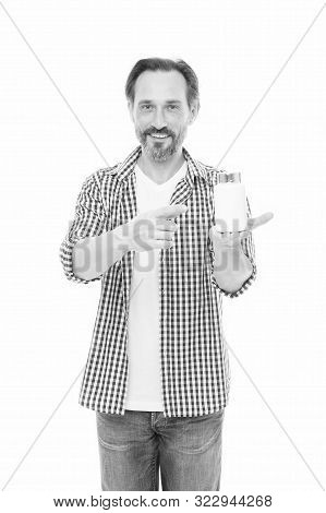 Health Is Priceless. Mature Man Holding Vitamins Bottle. Senior Man Taking Vitamin Complex. Vitamins