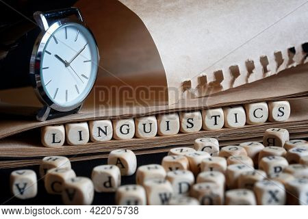 Word: Linguistics Next To Letters, Wristwatch And Notepad. The Concept Of Scientific Research In Lin