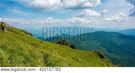 View From Pikui Mountain. Huge Stones On The Grassy Slopes. Summer Landscape Of Carpathian Mountains