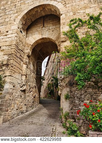 Stone Gate Of The Medieval Village Of Cordes-sur-ciel, France.