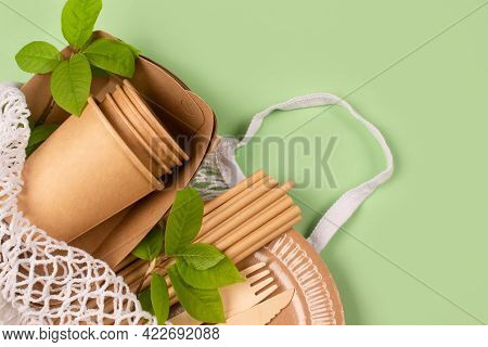 Close Up View Of Eco-friendly Tableware - Kraft Paper Food Cups And Containers With Wooden Cutlery I