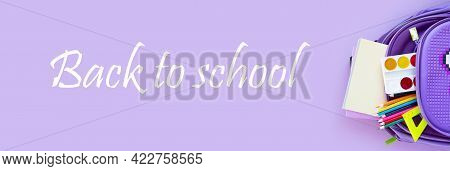 Back To School Concept. Backpack With School Supplies. Top View.