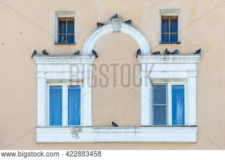 Facade With Pigeons Over The Arch To The Railway Station In The City Of Vladimir, Central Russia