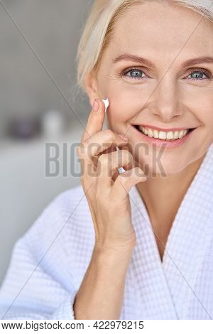 Vertical Portrait Of Beautiful Mid Age Older Adult 50 Years Old Blonde Woman Wears Bathrobe In Bathr