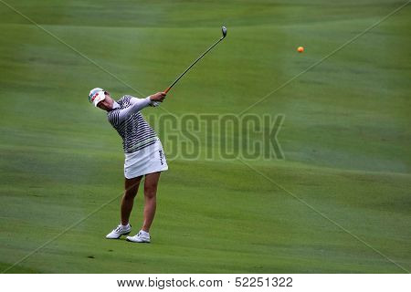 KUALA LUMPUR - OCTOBER 13: Chella Choi of South Korea hits the ball to the 2nd hole green of the KLGCC course on the final day of the Sime Darby LPGA on October 13, 2013 in Kuala Lumpur, Malaysia.