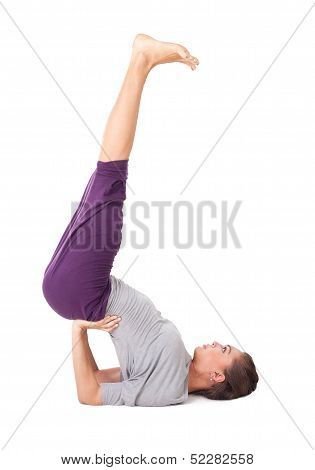 Young Woman Doing Yoga Exercise Supported Shoulderstand