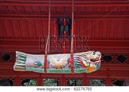 Photo Of Painted Wooden Fish Statue At A Chinese Temple,  Oil Paint Stylization