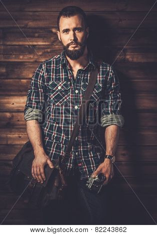 Man with messenger bag and camera 