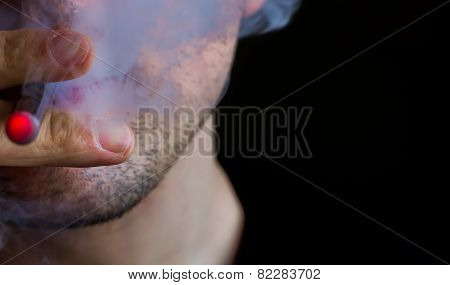 Man smoking electronic cigarette