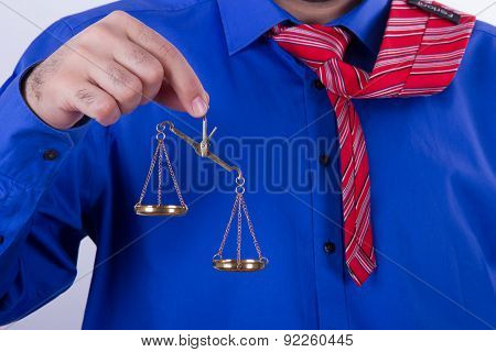 Businessman Shows Scales