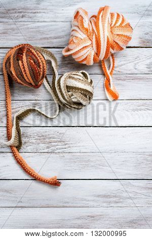 Handmade crocheted pot with wool . Top view.