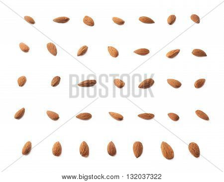 Set of multiple single almond seeds isolated over the white background