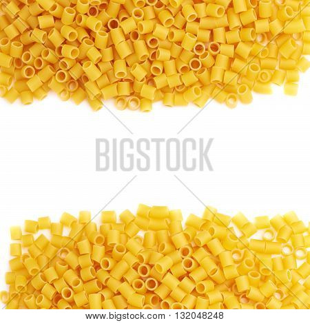 Set of pile of dry ditalini yellow pasta over isolated white background, different foreshortenings