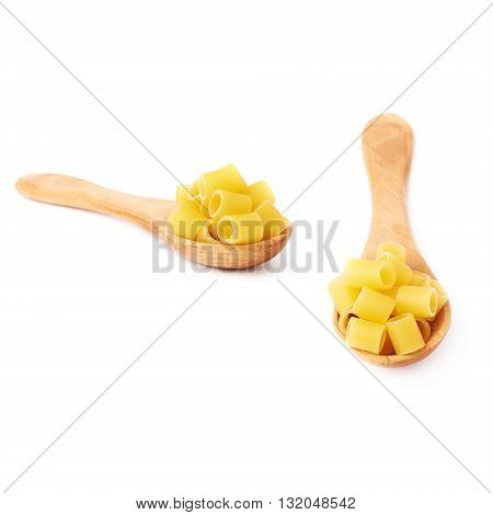 Set of wooden spoon filled with dry ditalini yellow pasta over isolated white background, different foreshortenings