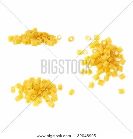 Pile of dry ditalini yellow pasta over isolated white background